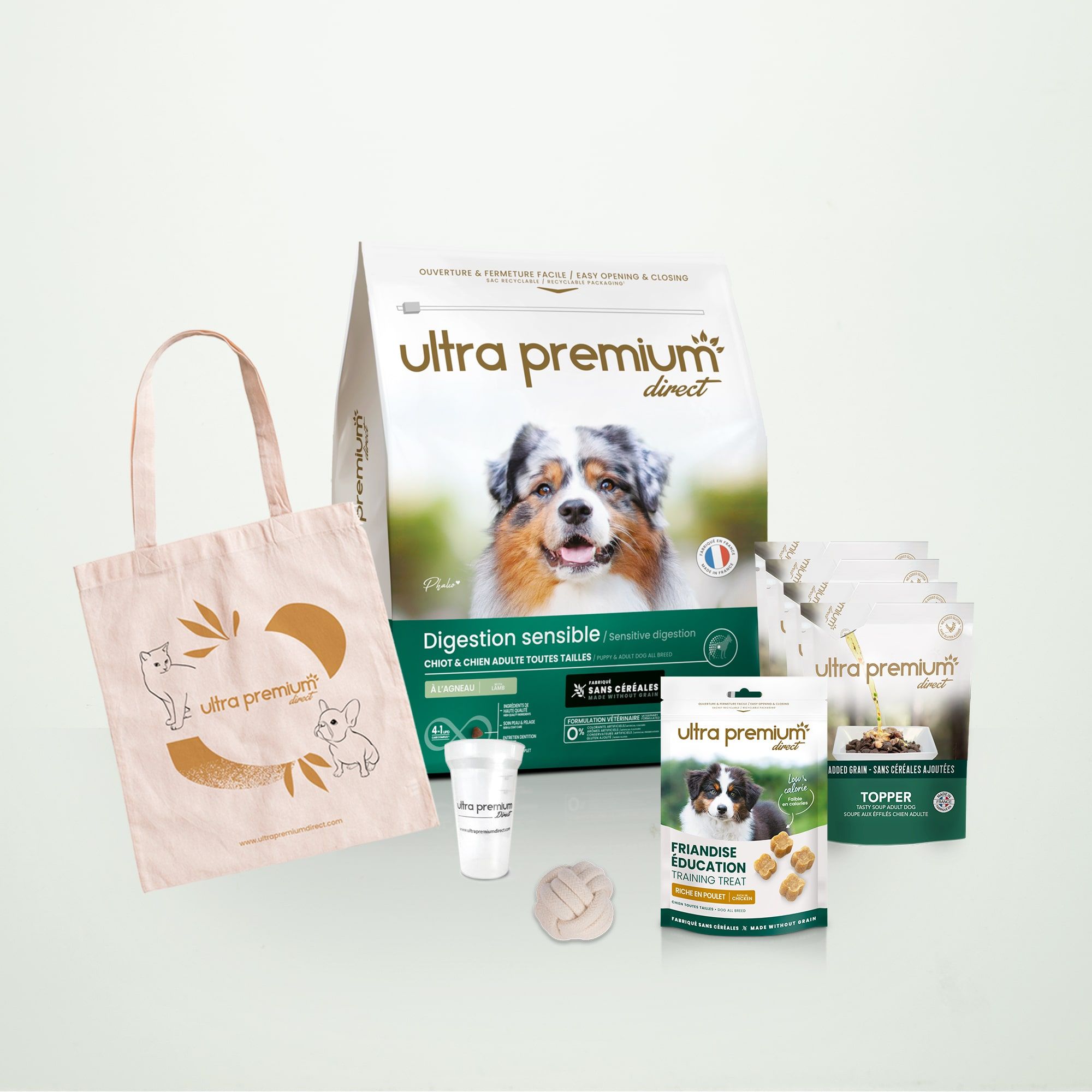 Welkomstpakket voor puppy's met een gevoelige spijsvertering van alle groottes, op een lichtgroene achtergrond