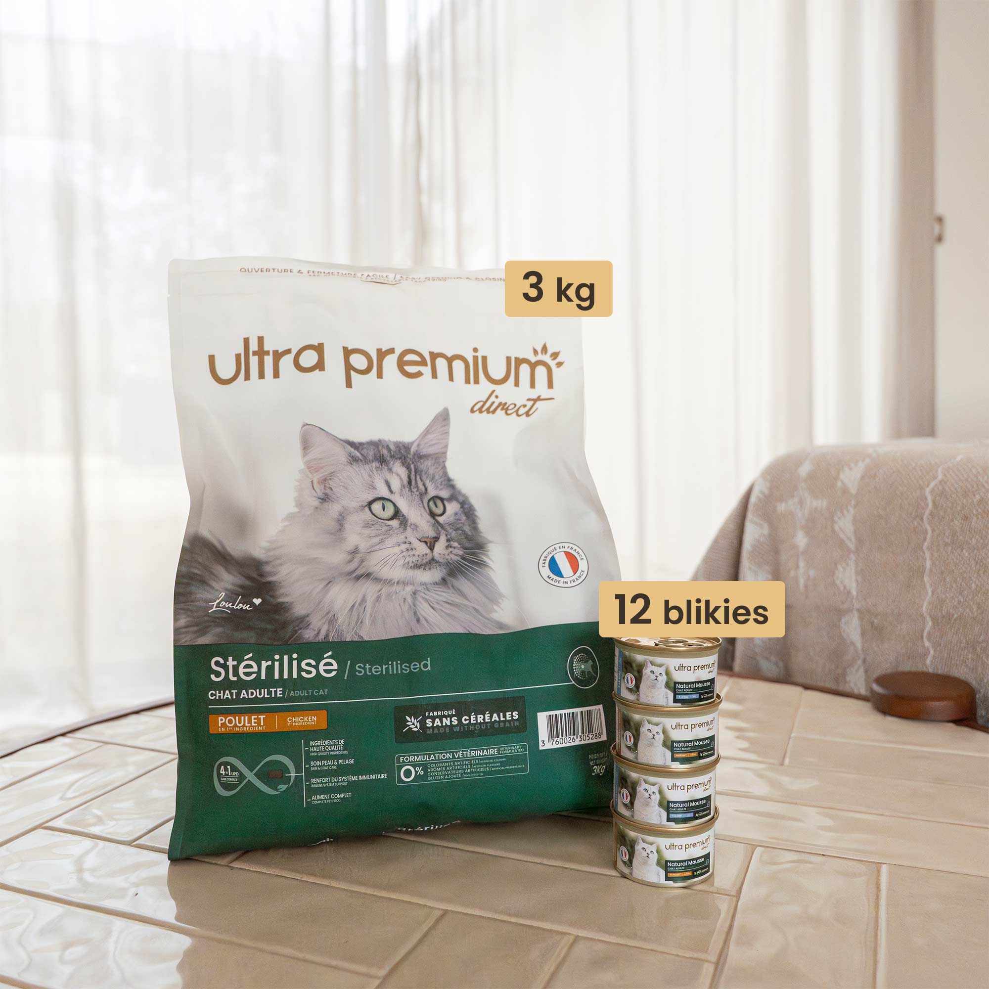 Dubbel voeding bestaande uit een zak van 3 kg graanvrije brokken voor gesteriliseerd volwassen kat , en 12 blikjes graanvrije mousse voor volwassen kat met kip & tong, binnenshuis