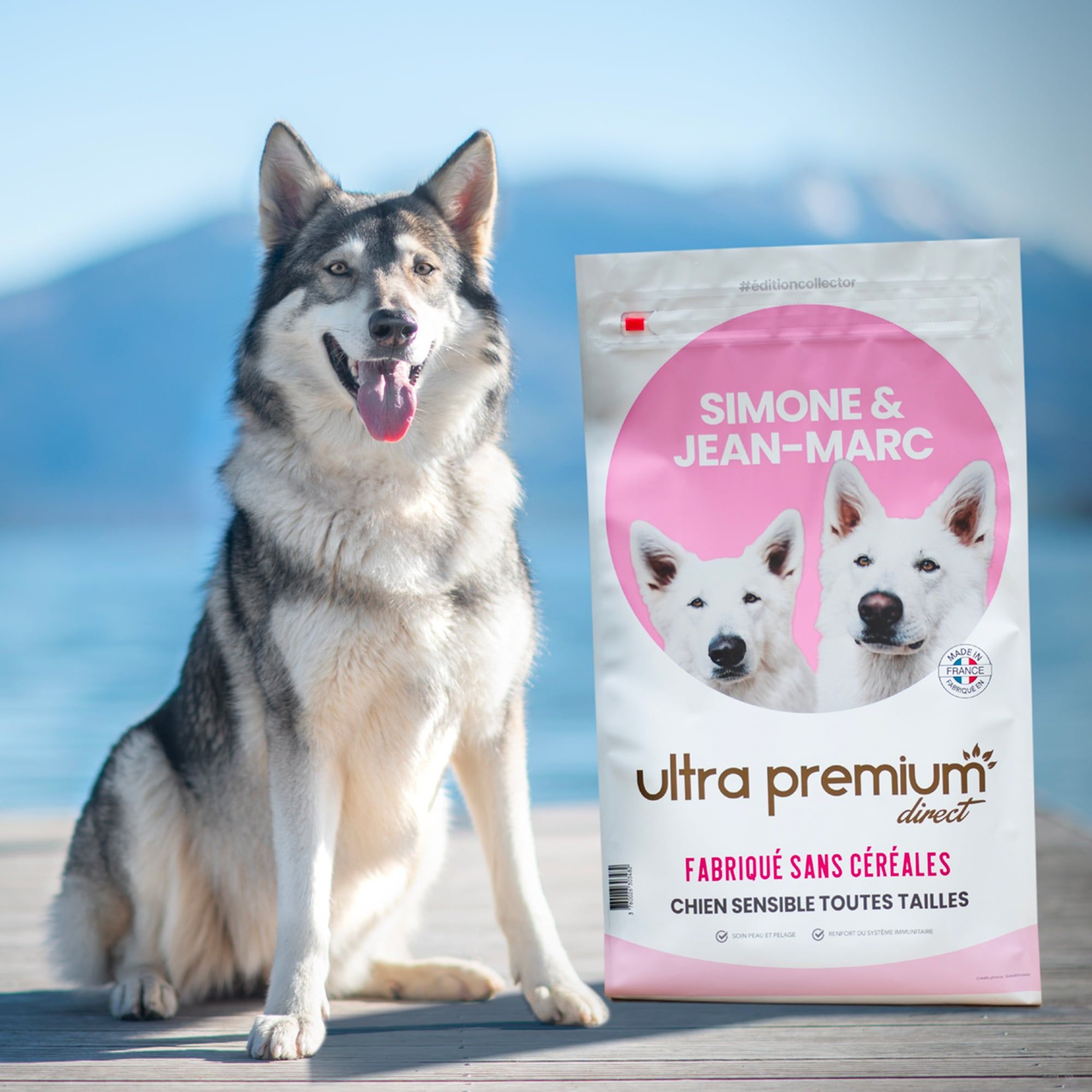 Inuit du nord en extérieur se tenant à côté d'un sac de croquettes sans céréales de l'édition collector Simone & Jean-Marc