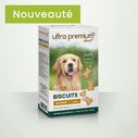 Boite de 400g de biscuits pour chien de 4cm en forme d'os sur fond vert
