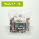 Sachet de cous de poulet pour chien sur fond vert clair