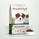 Graanvrije Brokken met verse kip voor puppy's van alle groottes in een zak van 12 kg op witte achtergrond