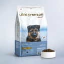Gamelle contenant les croquettes Super Premium pour chiot de grande taille en gros plan
