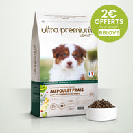 Croquettes sans céréales au poulet frais pour chiot de toutes tailles en sac de 12 kg sur fond blanc