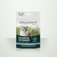 Zak met kalmerende graanvrije snacks, op kat achtergrond