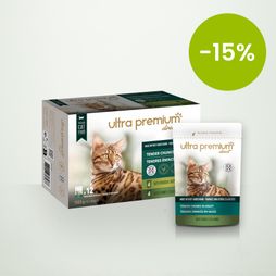Gesneden vlees in graanvrije saus voor kat met kip & kalkoen op een lichtgroene ondergrond