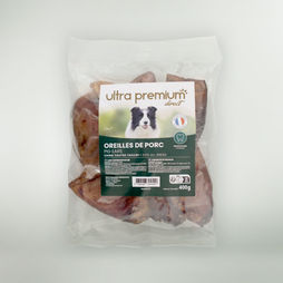 Sachet d'oreilles de cochon pour chien sur fond vert clair