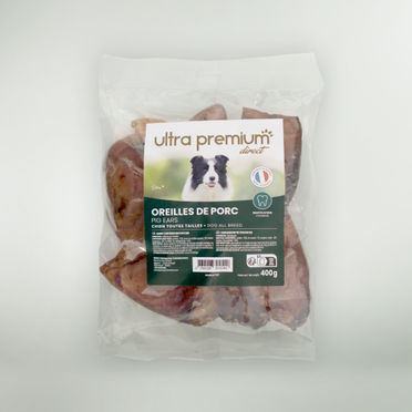 Sachet d'oreilles de cochon pour chien sur fond vert clair